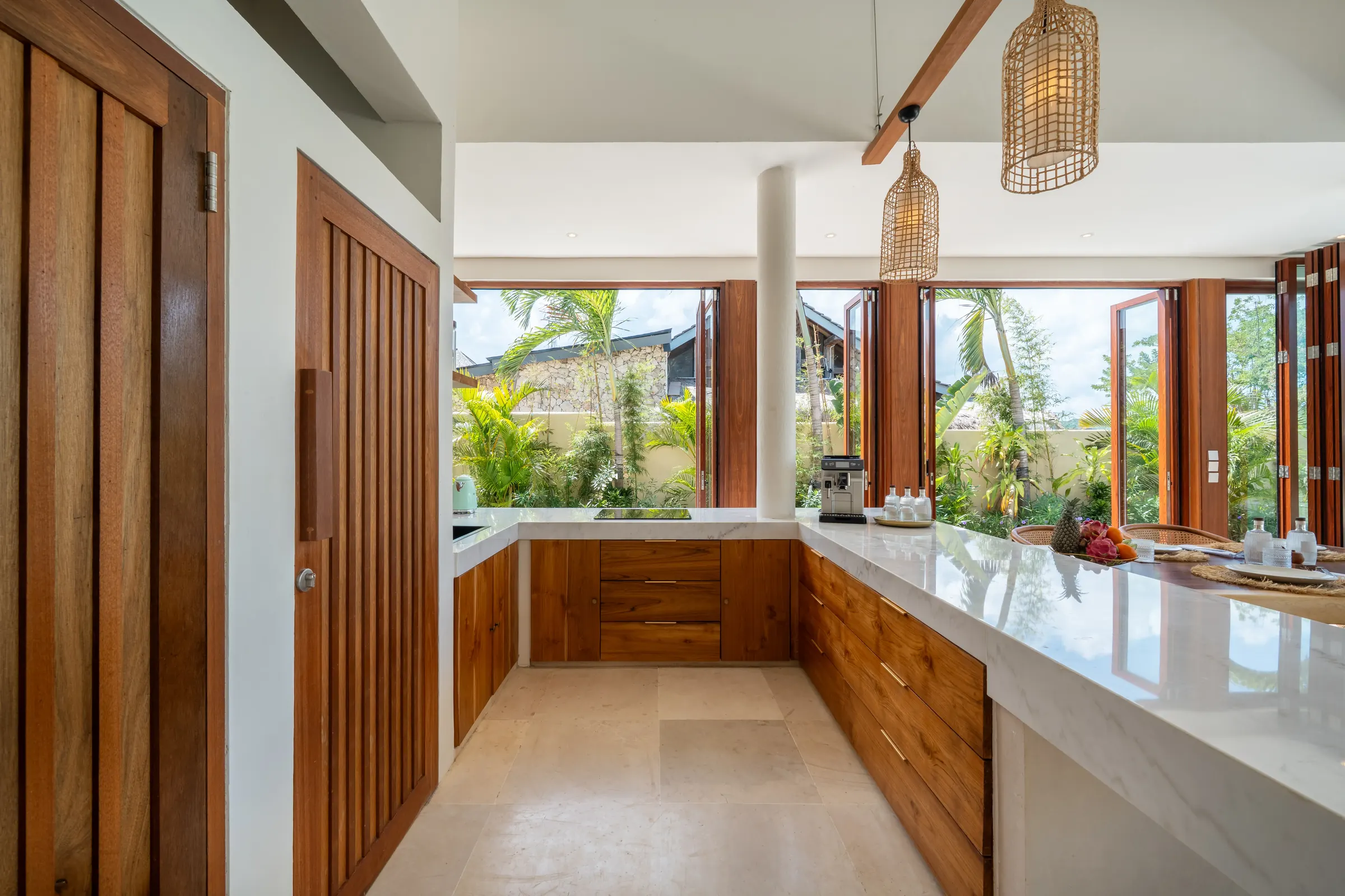 Teak kitchen with a white worktop