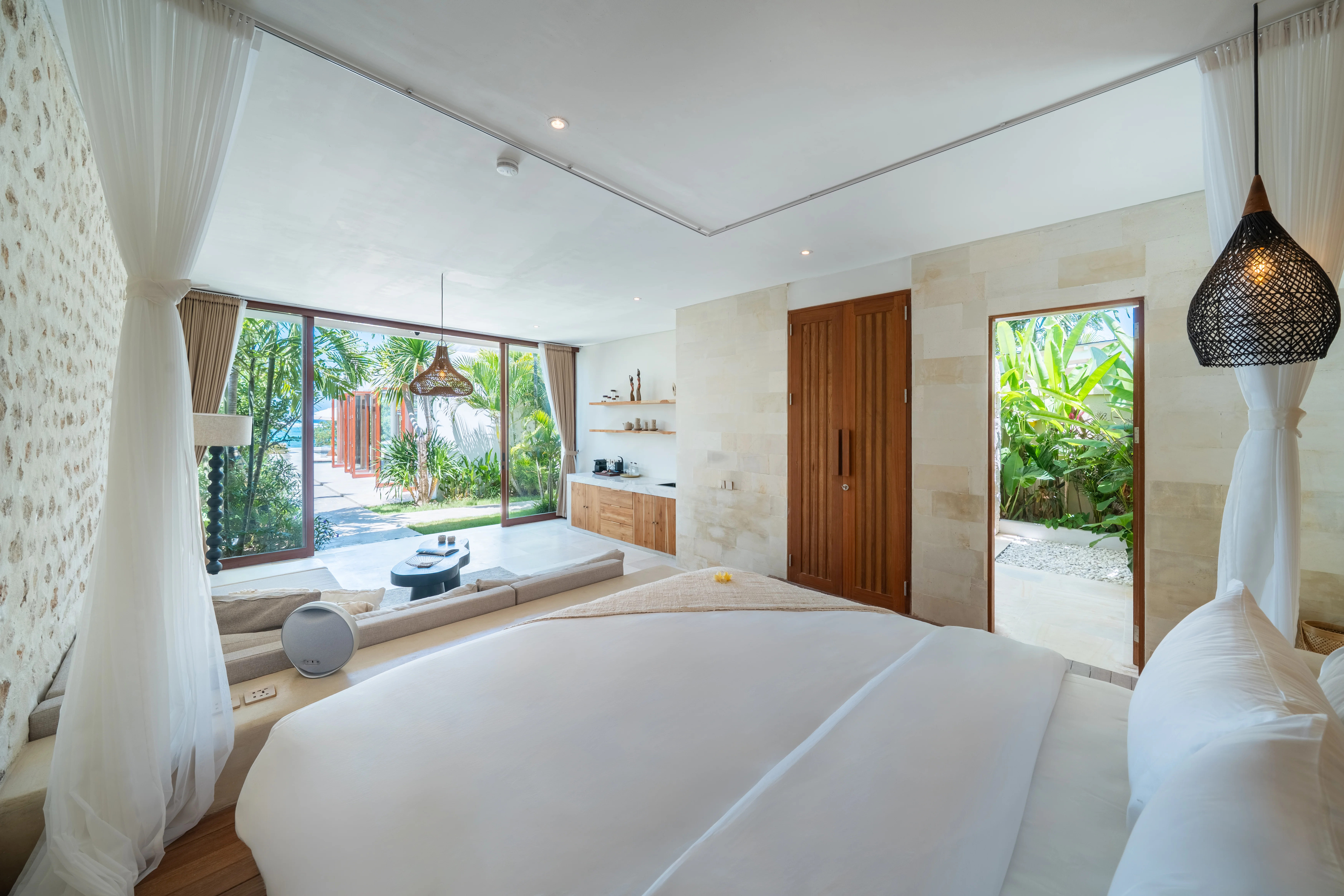 Self-contained garden pavilion suite with canopied king bed, Villa Kingfisher