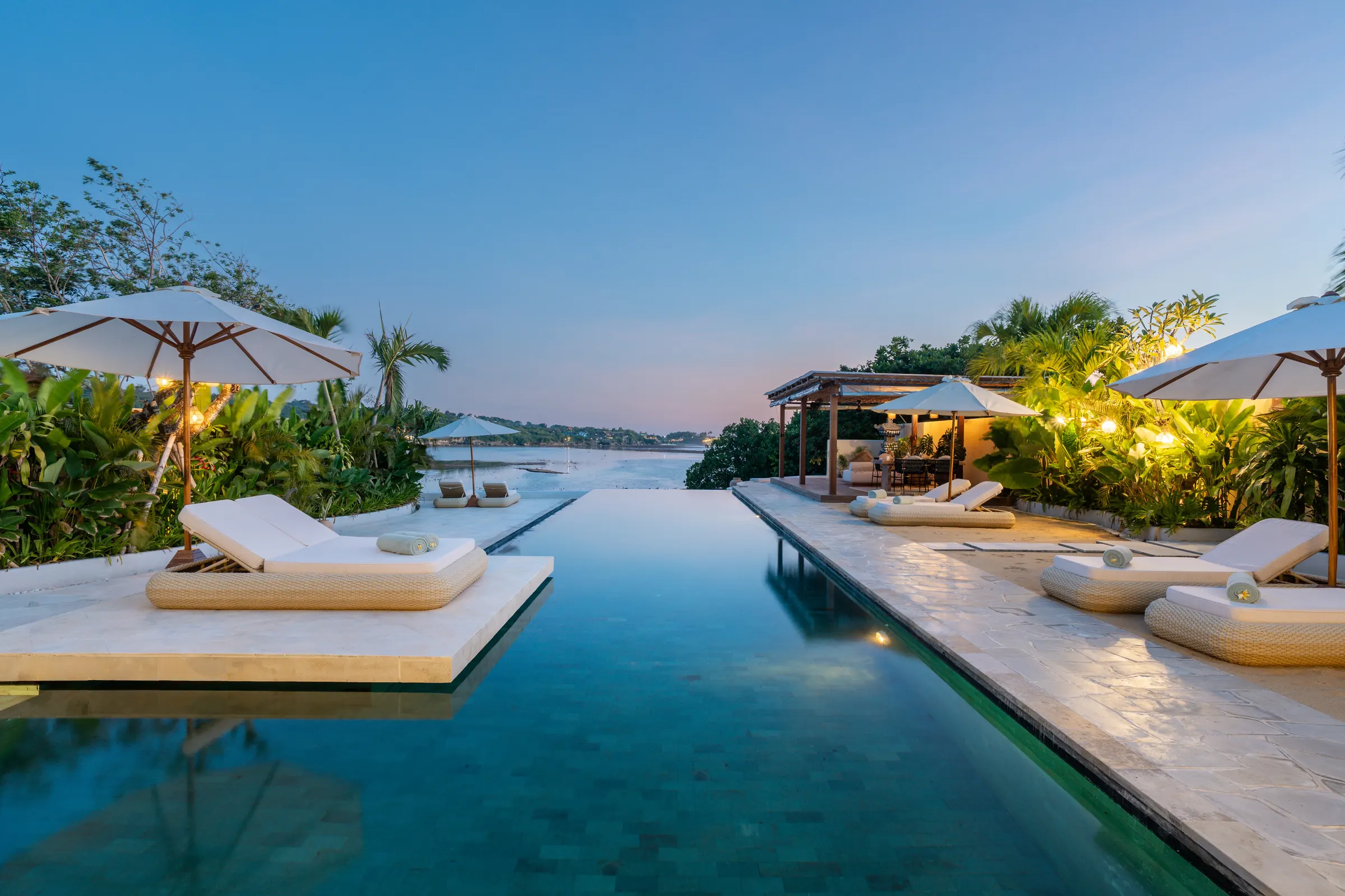 Illuminated infinity pool at twilight, Villa Kingfisher adults-only villa