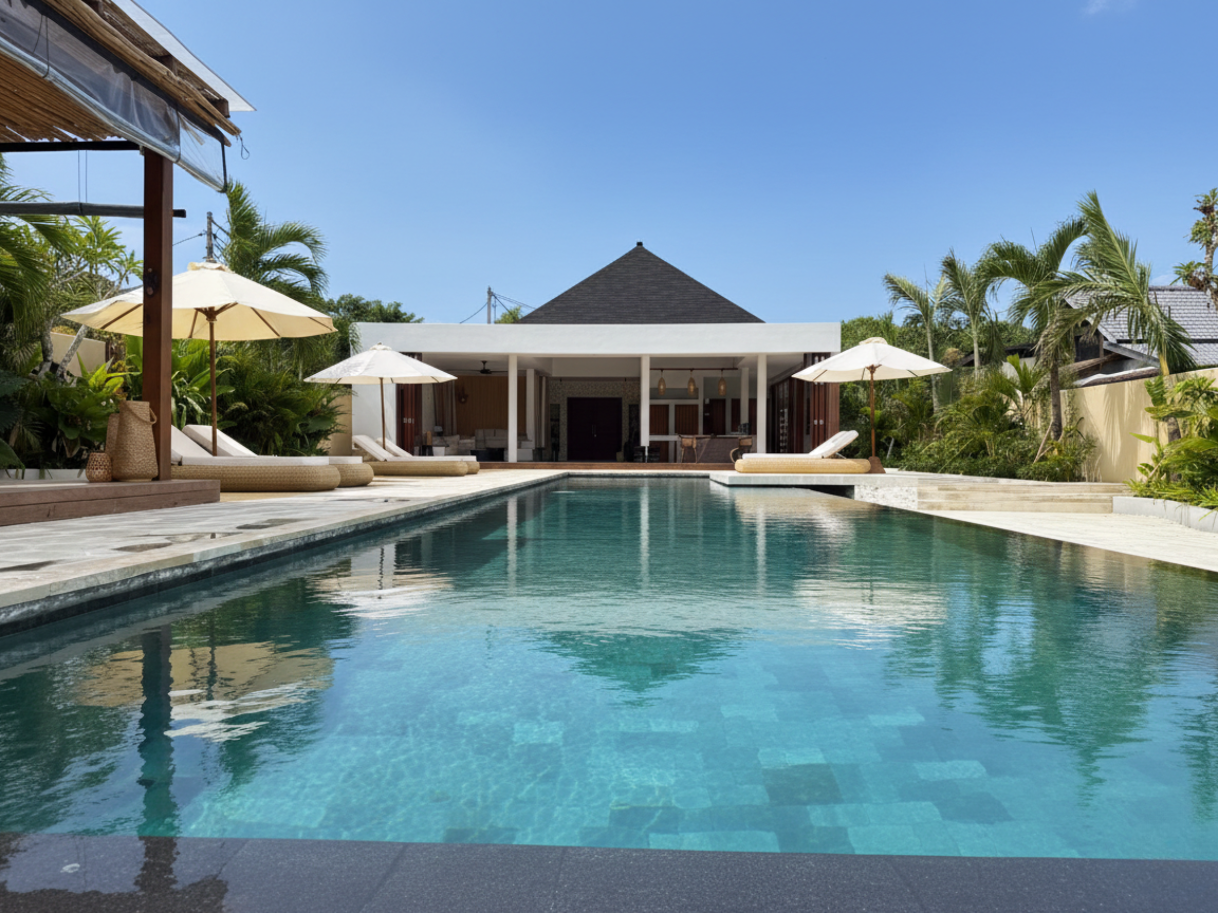 Open living area with handcrafted teak details
