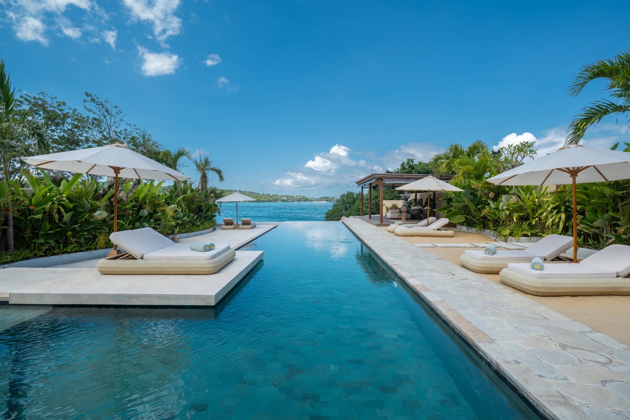 The 20-metre infinity pool stretching toward the sea, Villa Kingfisher