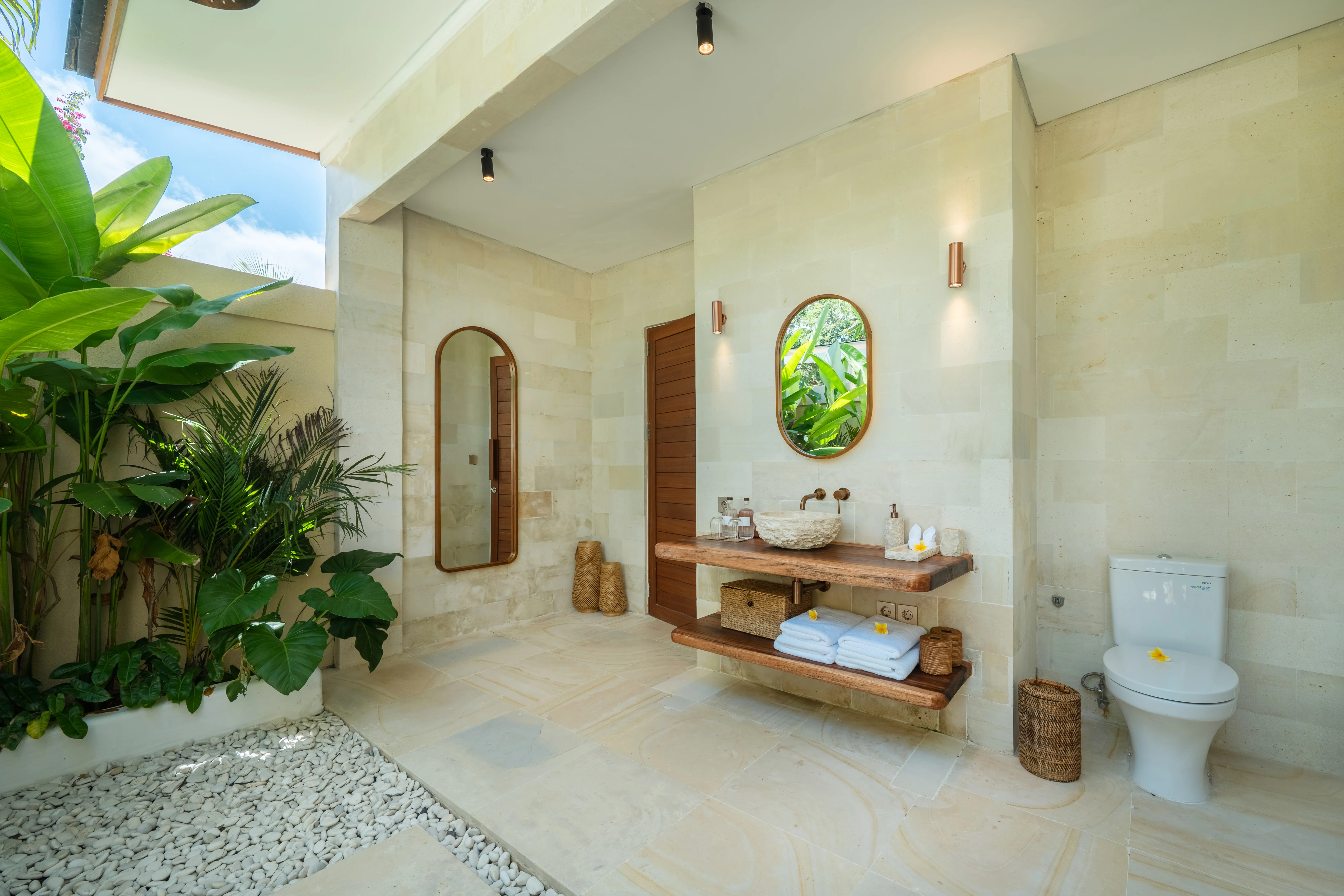 Bathroom vanity and WC with a green outlook